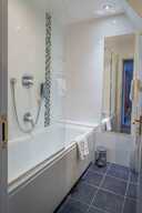 Family suite upper floor rear view (2 x room) bathroom